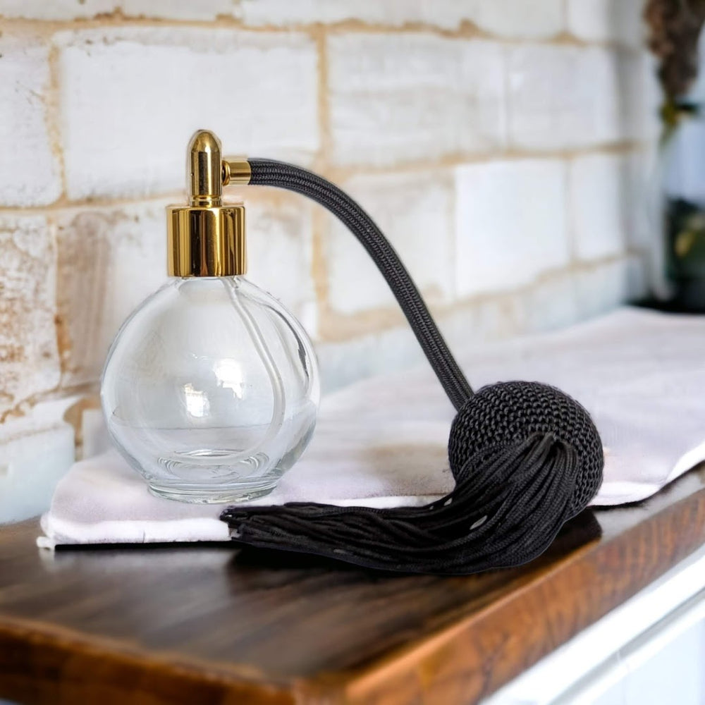 Clear glass 78ml round bottle perfume atomizer with Black tassel