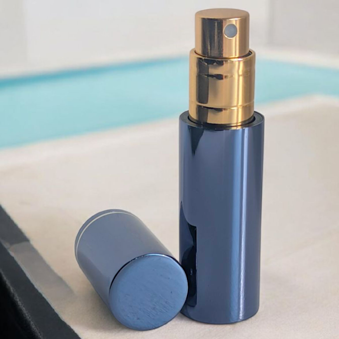 essential atomizer blue halo 5ml easy fill perfume atomizer spray with lid off on surface