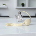 Clear glass 78ml round bottle perfume atomizer with Ivory tassel