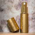 Elegant gold 8ml atomizer with silver dots