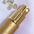 Elegant gold 8ml atomizer with silver dots
