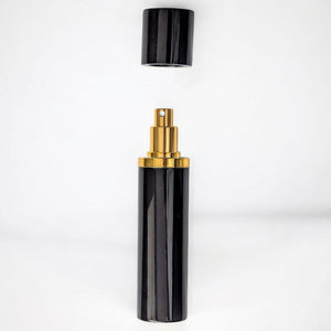 essential atomizer magnifico black and gold 10ml perfume atomizer on white background