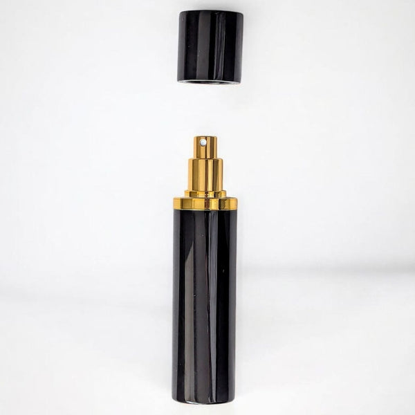 essential atomizer magnifico black and gold 10ml perfume atomizer on white background