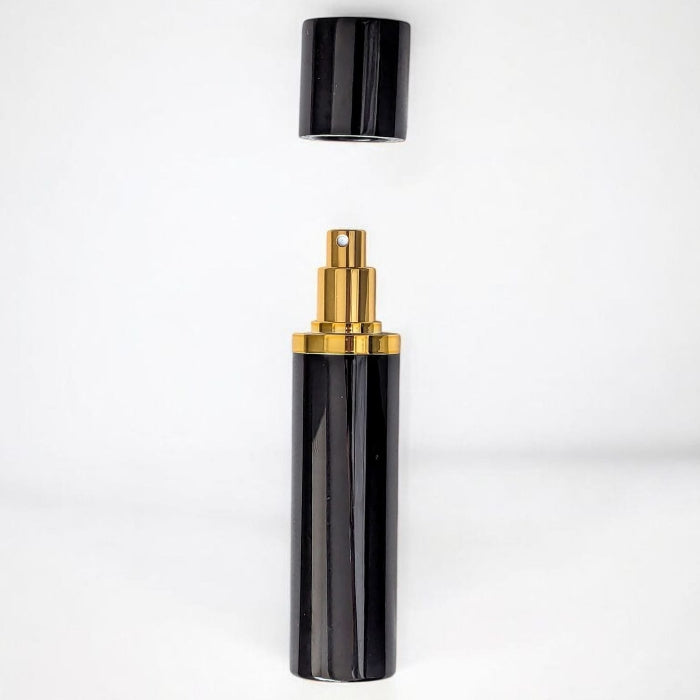 essential atomizer magnifico black and gold 10ml perfume atomizer on white background