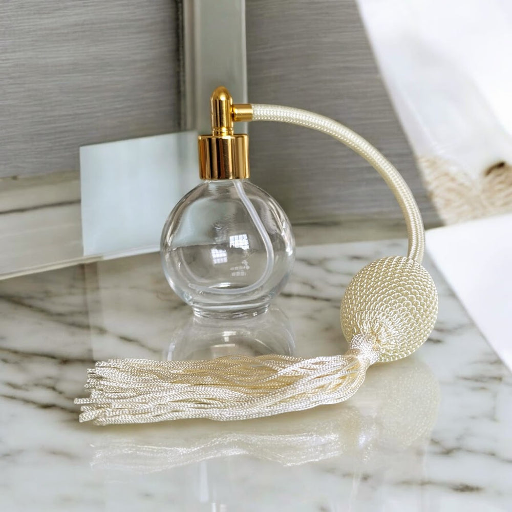 Clear glass 78ml round bottle perfume atomizer with Ivory tassel & Gold fitting