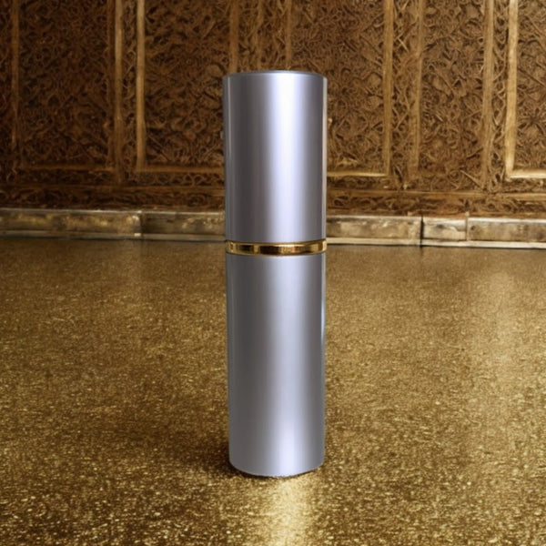 lavender perfume atomizer on gold surface