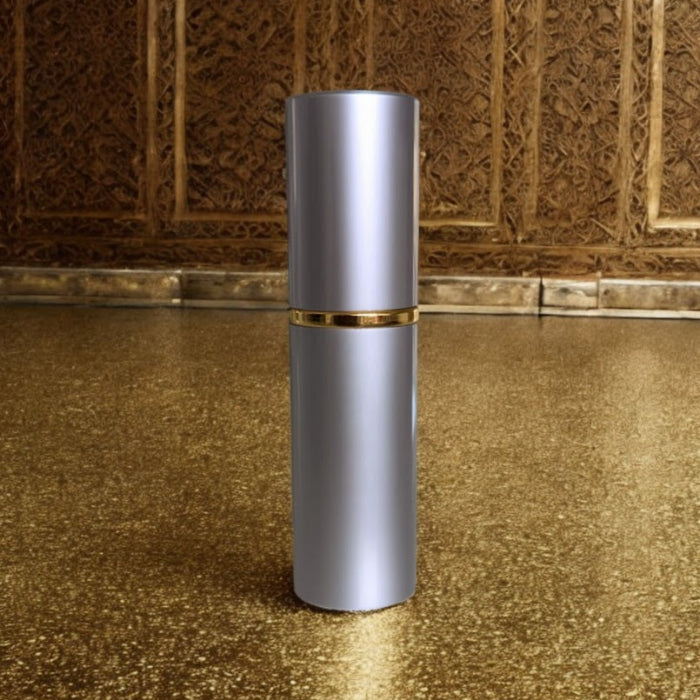 lavender perfume atomizer on gold surface