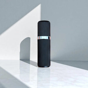 essential atomizer perfume atomizer. black plastic moulded with magnetic lid and silver metal fitting