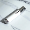 vapora white easy fill perfume atomizer with lid on on marble top