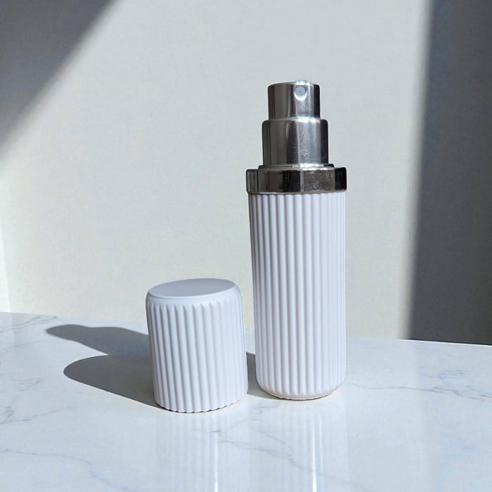 essential atomzier luxe 8ml perfume atomizer in white with lid off
